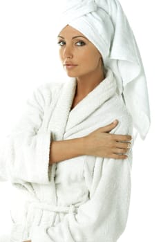 Portrait of Fresh and Beautiful brunette woman wearing white towel on her head