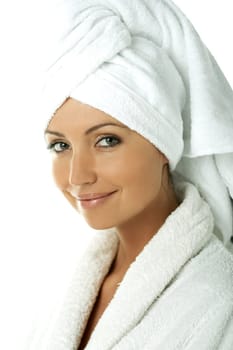 Portrait of Fresh and Beautiful brunette woman wearing white towel on her head