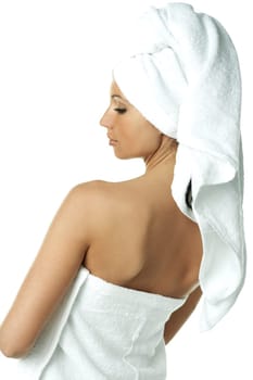 Portrait of Fresh and Beautiful brunette woman wearing white towel on her head