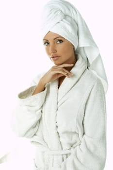 Portrait of Fresh and Beautiful brunette woman wearing white towel on her head