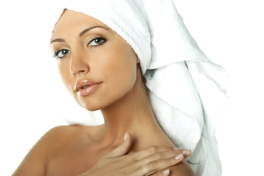 Portrait of Fresh and Beautiful brunette woman wearing white towel on her head