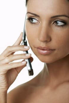 Portrait of Fresh and Beautiful brunette woman using cell phone