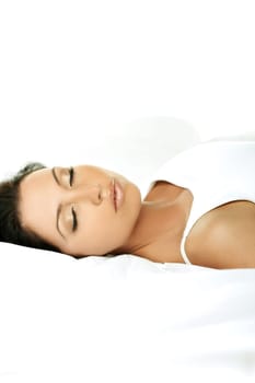 Young Beautiful woman lying on the bed