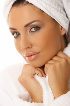 Portrait of 20-25 years old beautiful woman wearing towel on her head