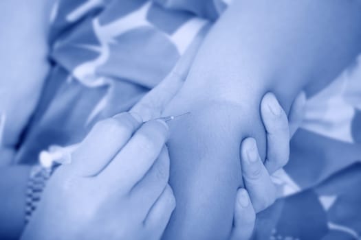 Doctor given a vein injection