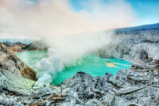 Crater of volcano Ijen at sunrise time. Java. Indonesia.