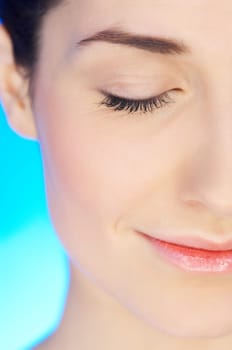 Part of beautiful face of a woman with eye closed