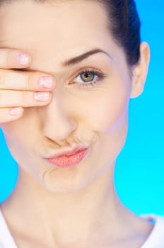 Portrait of 20-25 years old beautiful woman with eye covered by hand