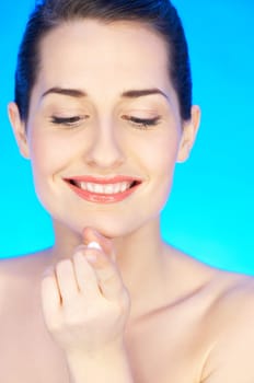Portrait of 20-25 years old beautiful woman with cream