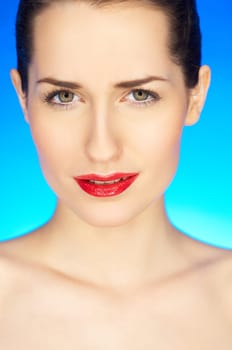Portrait of beautiful woman with red lipstick