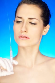 Portrait of Beautiful woman, she recieving a botox injection