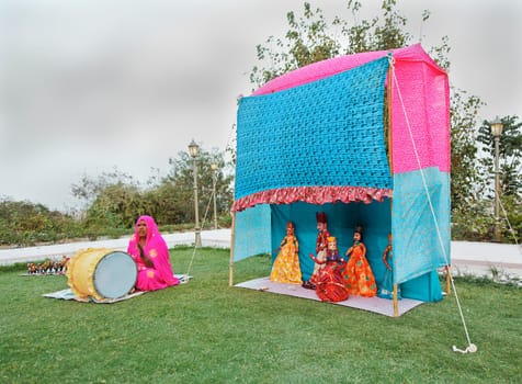 Landscape in a garden of a performance by local puppeteers during and early evening performance, Rajasthan, Indian - March 7, 2012