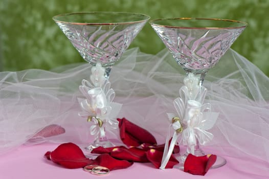 Arrangement with flowers and wedding rings