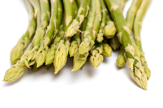 Close-up of green asparagus on white background