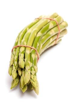 A bunch of green asparagus on a white background
