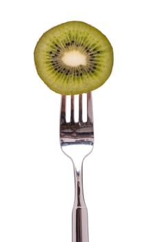 Green kiwi on a fork white cropped