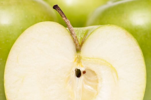 Slice of a green Golden Delicious apple