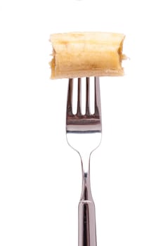 White isolated bitten banana on a fork