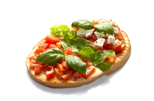 italian bruschetta with fresh tomatoes, basil, garlic, olive oil and cheese