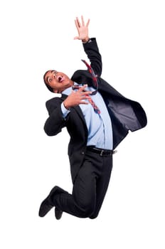 Happy businessman jumping isolated in white