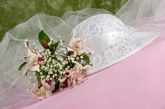 Arrangement with flowers and favors for wedding, baptism and First Communion