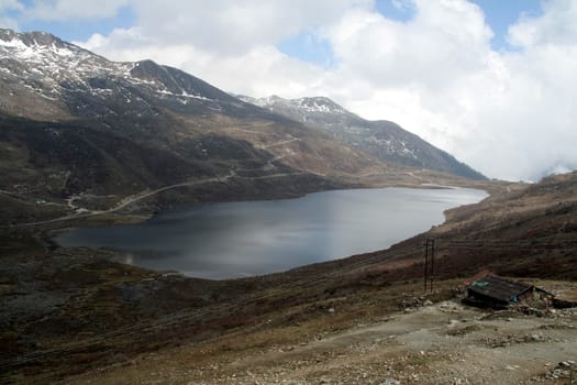 Lake on lap of mountain at high altitude, 60 km away from Ganktok, Sikkim, India, Asia