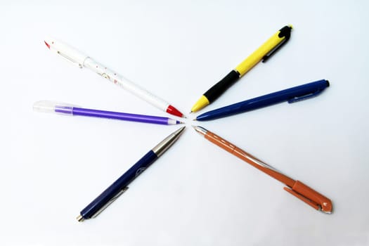 Set of ball pens of different colours isolated on white