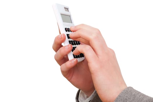 Woman's hand operating a calculator