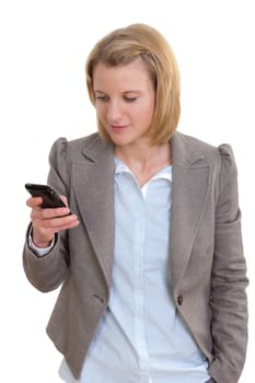 Young woman looking at smart phone in her hand