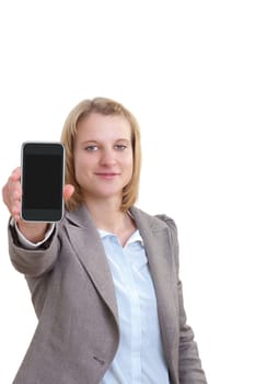 Young woman holding smart phone at camera
