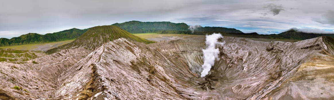 Crater of volcano Bromo at sunrise time. Indonesia