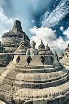 Buddha statue in stupa. Borobudur. Java. Indonesia