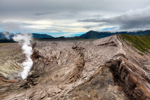 Crater of volcano Bromo at sunrise time. Indonesia