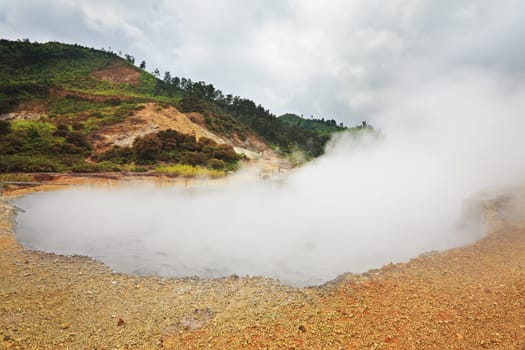 Mud crater Sikidang at plateau Dieng. Java