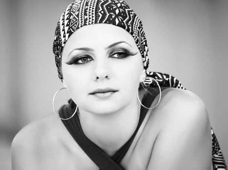 Fashion style high key portrait of woman
