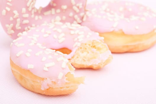 Closeup of Homemade Donuts with Pink Icing - Shallow Depth of Field