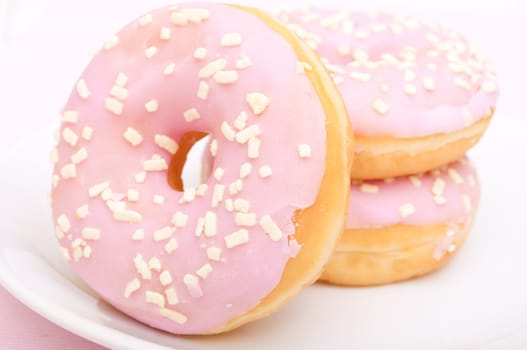 Closeup of Homemade Donuts with Pink Icing - Shallow Depth of Field