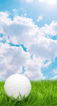 Golf Ball in Grass and Blue Sky