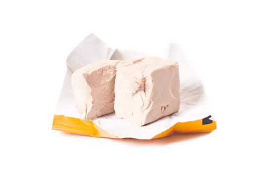 Fresh baker's yeast on white background