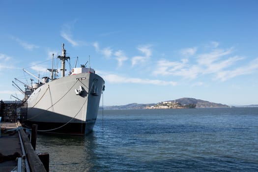 A war ship at dock in the open ocean