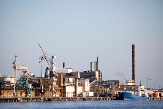 An industrial shipping dock on the sea
