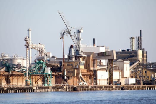 An industrial shipping dock on the sea