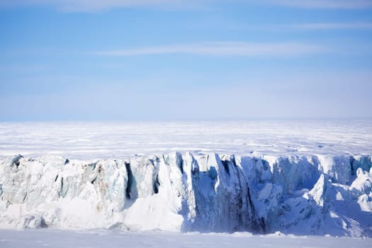 A glacier on the coast of Spitsbergen, Svalbard, Norway.