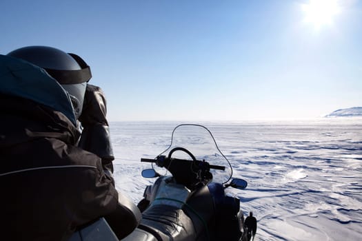 An expedition guide secures the area for polar bears.