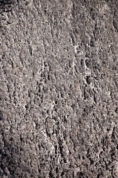 A dark grey an black stone texture