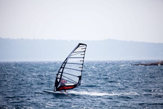 A wind surfer on the ocean
