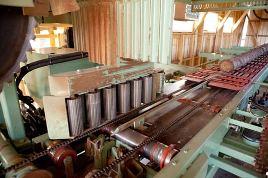 A lumber mill detail showing a log ready to be cut