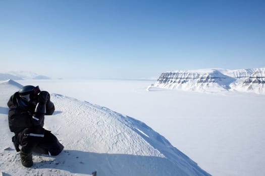 A winter wilderness adventure guide.  Spitsbergen, Svalbard, Norway