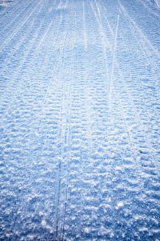 Snow texture background from snowmobile tracks
