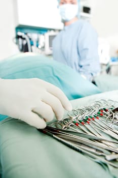 A detail close up of surgery instruments in a sterile environment